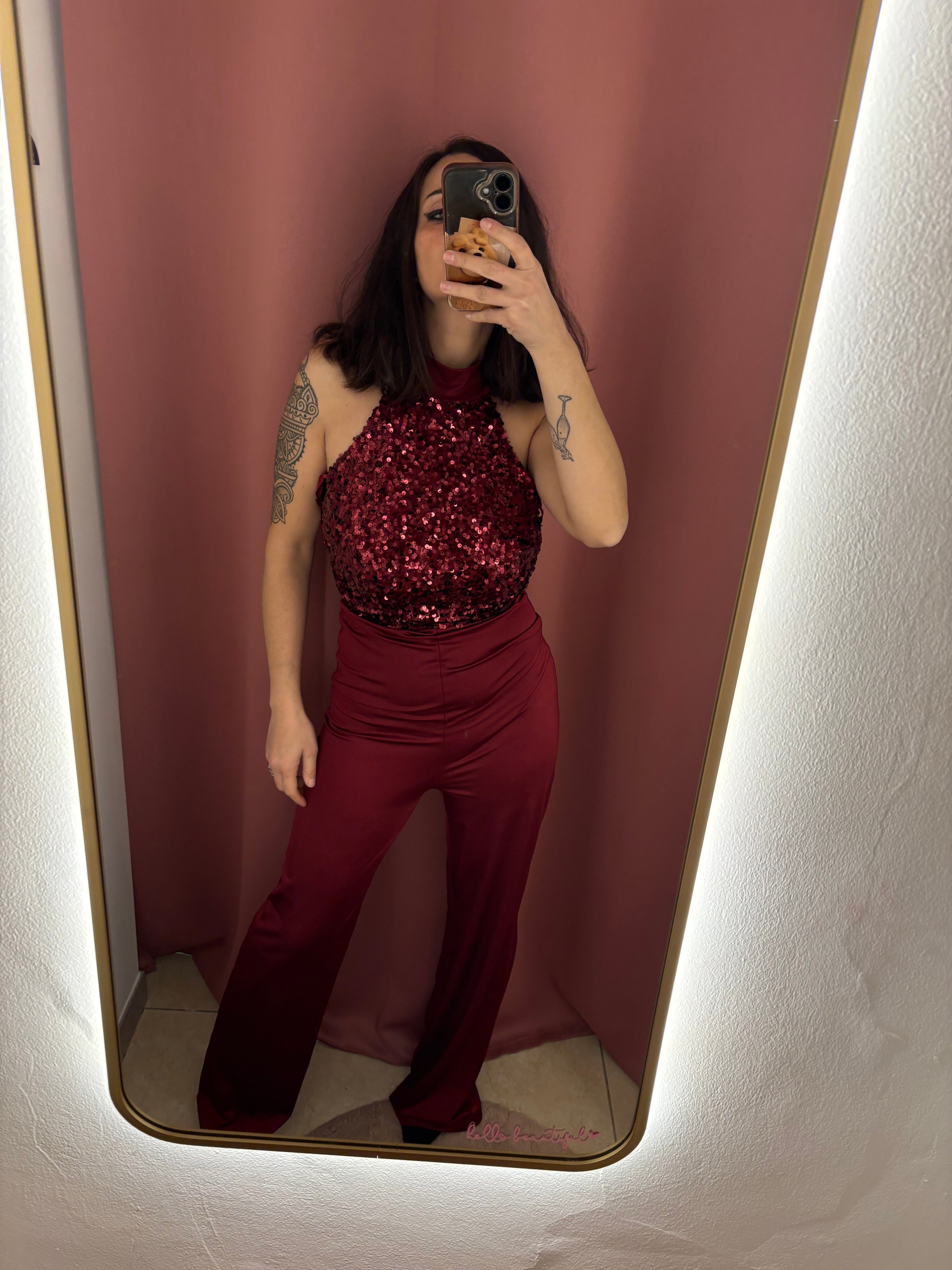 Tuta con paillettes