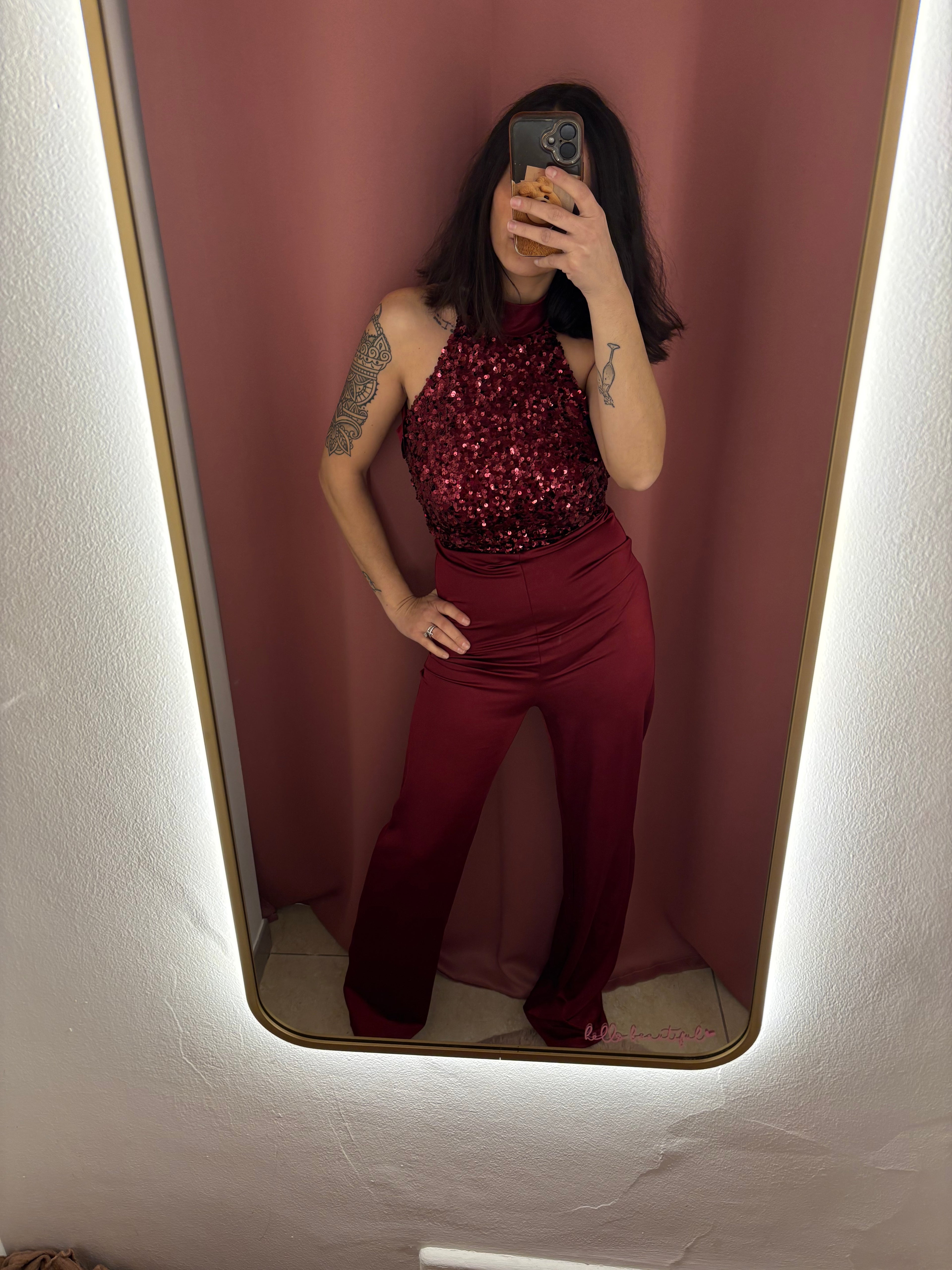 Tuta con paillettes